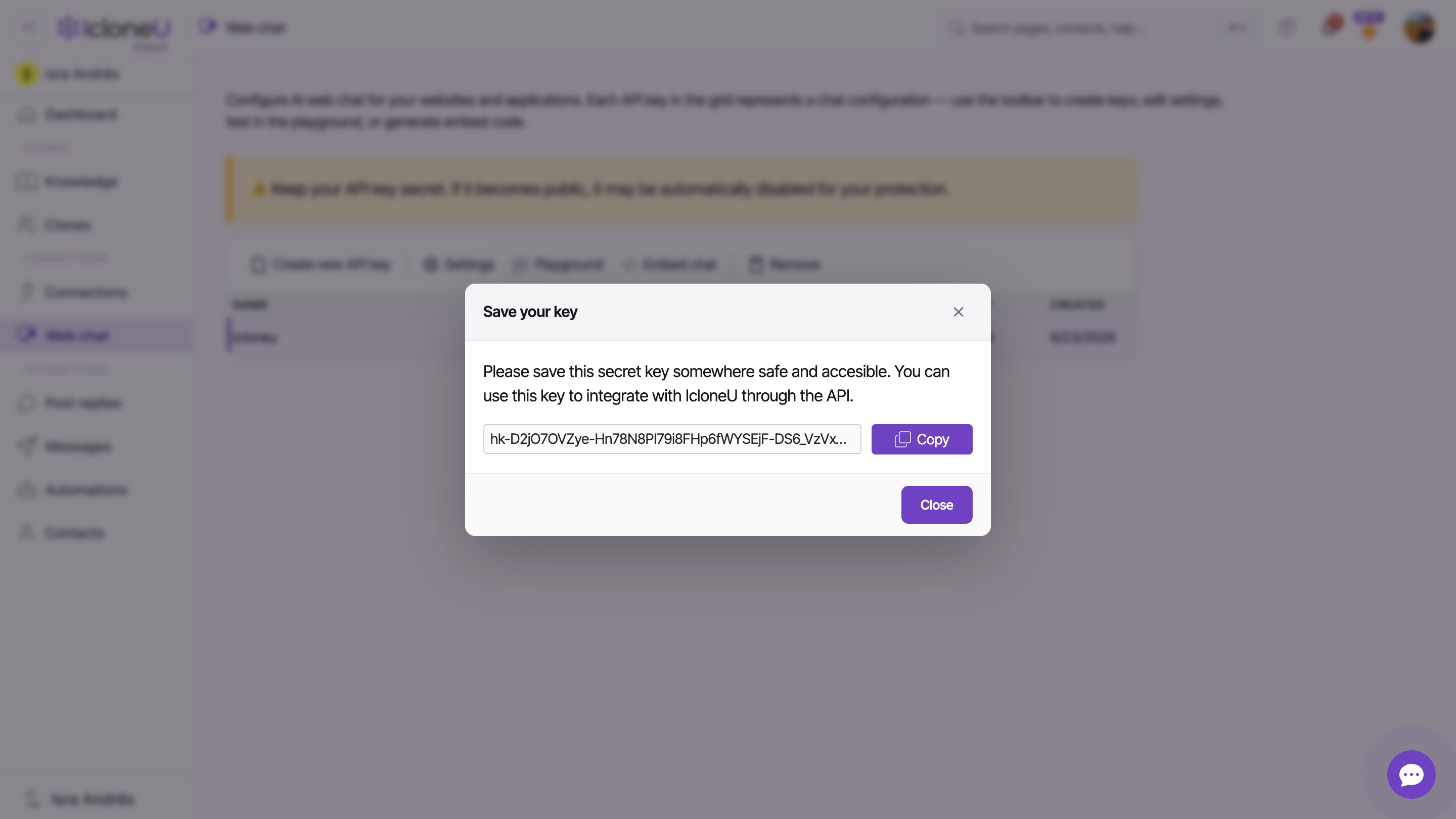 The Save your key dialog showing the full secret key with the Copy button