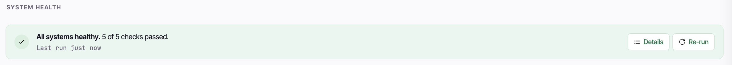 The System Health banner in its green passed state showing All systems healthy with a checks-passed count, a last-run time, and the Details and Re-run buttons